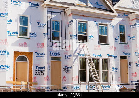 DuPont Tyvek house wrap applied on new home construction - Virginia USA Stock Photo