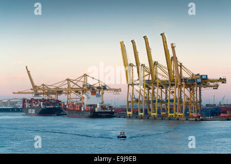 Cargo ships docked for import and export at Barcelona international shipping port in Barcelona, Spain. Stock Photo