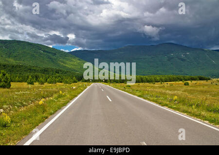 Scenic road in region of Lika Stock Photo