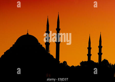 Istanbul, Turkey. 2nd Oct, 2004. Historic 17th century Sultan Ahmed mosque silhouetted by a dramatic sunset. Famous for the beautiful blue tile work ornamenting its interior walls it is also known as the Blue Mosque of Istanbul. Built in seven years (1609-1616) by the architect Mehmet Aga on the order of Sultan Ahmed I, it became the city's most important mosque with its one main dome, six minarets, and eight secondary domes. © Arnold Drapkin/ZUMA Wire/Alamy Live News Stock Photo