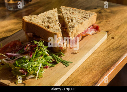 Thick wholemeal bread bacon sandwich Stock Photo