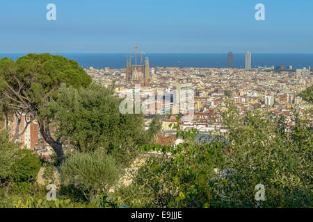 Barcelona by day seen from Parc Guell include sagrada familia, agbar tower, scyscrapers, la rambla and other Stock Photo