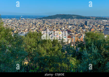 Barcelona by day seen from Parc Guell include sagrada familia, agbar tower, scyscrapers, la rambla and other Stock Photo