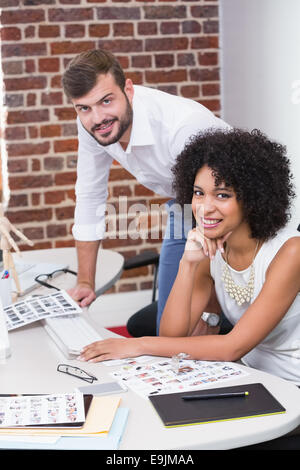 Portrait of smiling photo editors Stock Photo