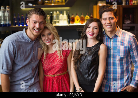 Happy friends smiling at camera Stock Photo