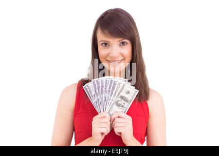 Young woman holding her cash Stock Photo