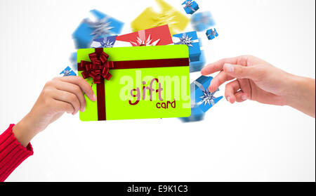 Composite image of hands holding card Stock Photo