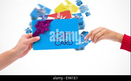 Composite image of hands holding card Stock Photo