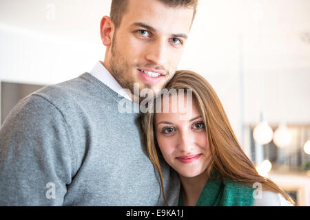 Portrait of confident young couple at cafe Stock Photo