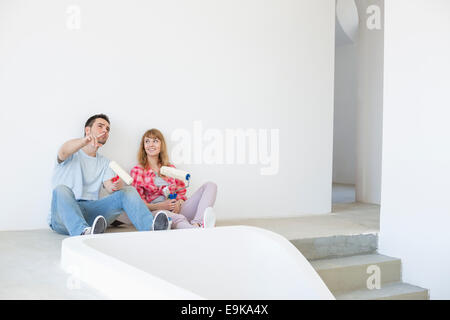 Couple getting ready to paint Stock Photo