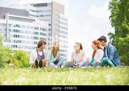 University students studying together on campus ground Stock Photo