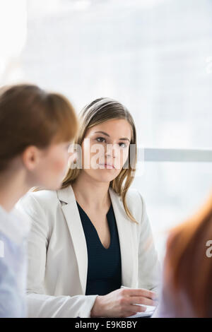 Beautiful businesswoman in meeting at office Stock Photo