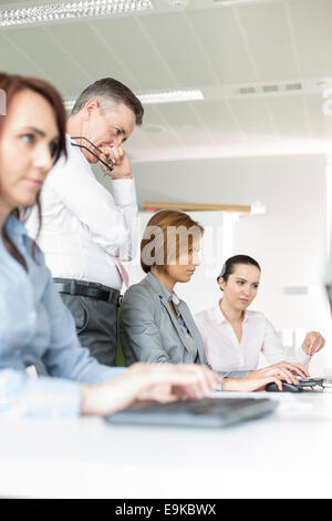 Business people working in office Stock Photo