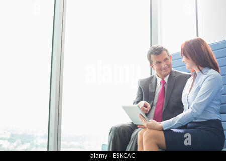 Business people using tablet PC in office Stock Photo