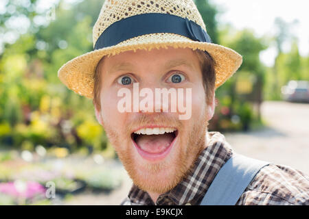 Close-up portrait of surprised gardener Stock Photo