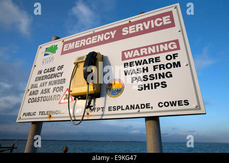 Council, warning, Coastguard, Emergency Service, phone, sign, Egypt Esplanade, Cowes, Isle of Wight, England, UK, Stock Photo