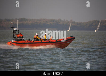 RNLI Crew, Volunteer, Mudeford, inshore, Lifeboat, The Solent, Centre, Center, Cowes, Isle of Wight, England, UK Stock Photo