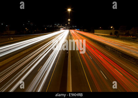 A view of Light trails on a highway Stock Photo