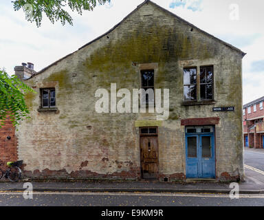 Old house in need of some TLC and refurbishment with mould growing on the walls Stock Photo