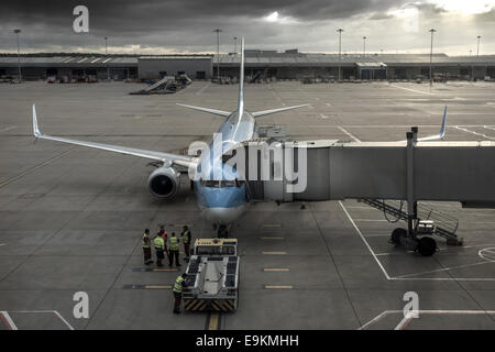 A Thompson Holiday Boeing 737 prepares to depart from its gate at Stansted Airport in  the UK. Stock Photo