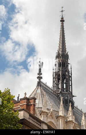 Spire of La Sainte-Chapelle. Gothic chapel The Holy Chapel placed on the Ile de la Cite island in the center of Paris, France Stock Photo