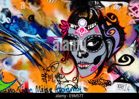 Graffiti street art Berlin Wall women scary face
