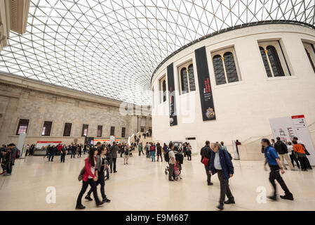 LONDON, United Kingdom — The Queen Elizabeth II Great Court at the British Museum. This expansive public square, designed by Foster and Partners, features a distinctive glass and steel roof made of 3,312 unique panes, and surrounds the historic Reading Room. Opened in 2000, it is the largest covered public square in Europe, serving as a central hub for visitors. Stock Photo