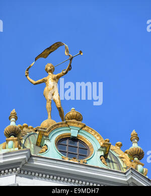 Antique style golden statue on lantern tower of historical building Maison du Roi d'Espagne on Grand Place in Brussels, Belgium Stock Photo