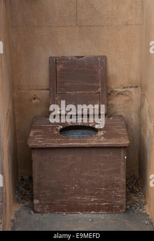 Abandoned toilet seat outdoors Stock Photo