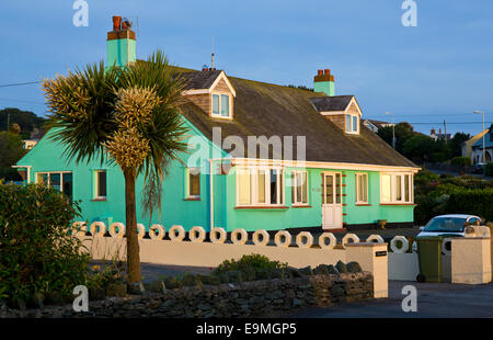 Colourful seafront home at Bull Bay (Porth Llechog) on the northern coast near Amlwch on Isle of Anglesey, North Wales UK, Stock Photo