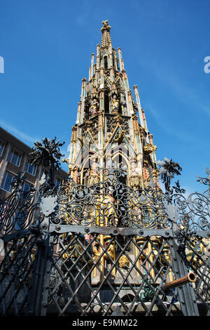 Gothic Beautiful fountain (Schoner brunnen) in Nuremberg, Bavaria, Germany. Stock Photo