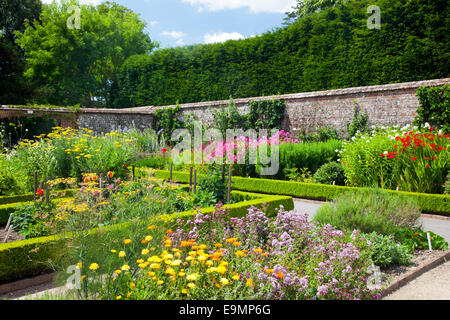 Some of the trial beds in the walled kitchen garden at West Dean Gardens, West Sussex, England, UK Stock Photo