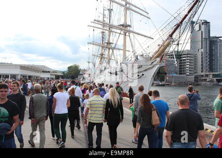 Gdynia, Poland , 17th August 2014: Crowd in Gdynia during operation Gdynia Sails. In the back Dar Pomorza museum ship Stock Photo