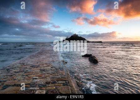 The causeway at high tide leading to St Michaels Mount at Marazion near Penzance in Cornwall Stock Photo