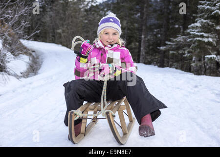 girl and sledge Stock Photo