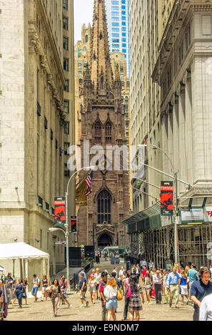 New York, NY - June 23, 2014: Trinity Church, built in 1846, and located at Broadway and Wall streets, in New York City. Stock Photo
