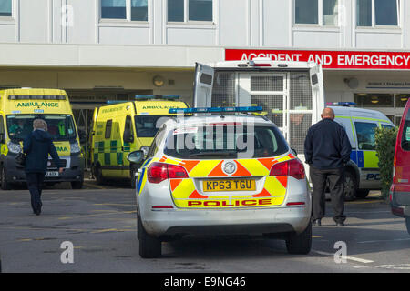 Police cars and Van outside Northampton General Accident and Emergency Dept. Stock Photo