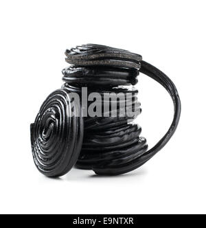 Stack of liquorice reels isolated on white background Stock Photo