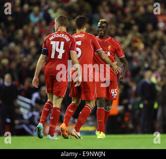 London, UK. 28th Oct, 2014. Liverpool's Mario Balotelli celebrates with goalscorer Dejan Lovren.League Cup Fourth Round- Liverpool vs Swansea City - Anfield - England - 28th October 2014 - Picture David Klein/Sportimage. © csm/Alamy Live News Stock Photo