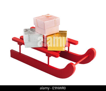 Wooden red sled with gift boxes on white background Stock Photo