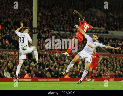 London, UK. 28th Oct, 2014. Liverpool's Mario Balotelli scoring his sides opening goal.League Cup Fourth Round- Liverpool vs Swansea City - Anfield - England - 28th October 2014 - Picture David Klein/Sportimage. © csm/Alamy Live News Stock Photo