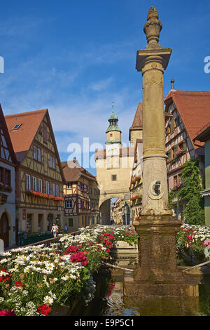 Markus Tower and fountain with Roederbogen, Rothenburg ob der Tauber, Bavaria, Germany Stock Photo