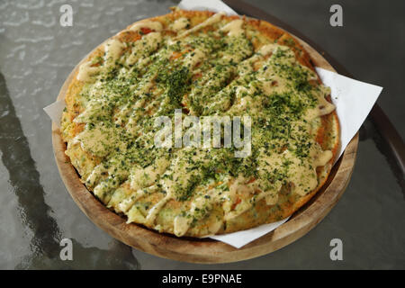 Pizza Japanese style in a cafe Stock Photo