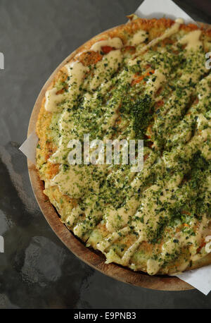 Pizza Japanese style in a cafe Stock Photo