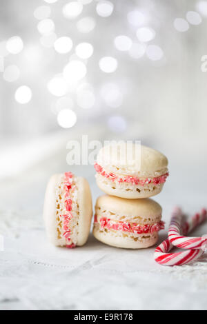 Christmas macarons with a crushed candy cane filling Stock Photo