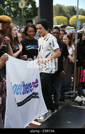 Austin Mahone seen at Universal Studios where he was interviewed by Mario Lopez for television show Extra.  Featuring: Austin Mahone Where: Los Angeles, California, United States When: 28 Apr 2014 Stock Photo