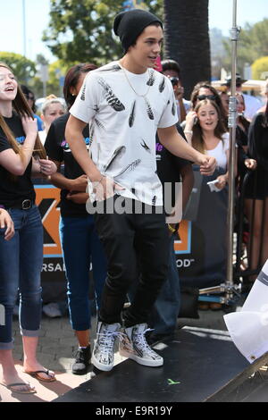 Austin Mahone seen at Universal Studios where he was interviewed by Mario Lopez for television show Extra.  Featuring: Austin Mahone Where: Los Angeles, California, United States When: 28 Apr 2014 Stock Photo