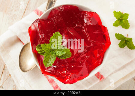 Homemade Red Cherry Gelatin Dessert in a Bowl Stock Photo