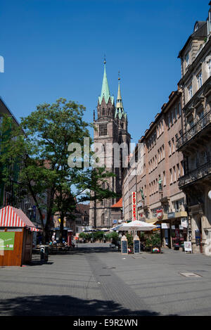 On the streets of the old town and The medieval-era Gothic style St. Lorenz Church, Nuremberg, Nürnberg, Stock Photo