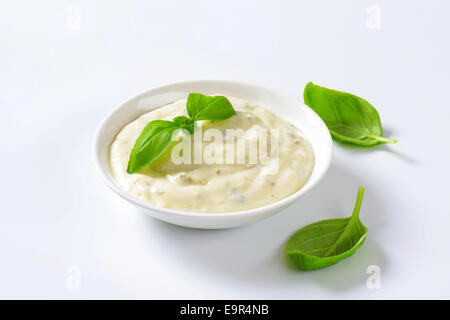 Creamy salad dressing made of mayonnaise, buttermilk, garlic, herbs, spices and grated cheese Stock Photo